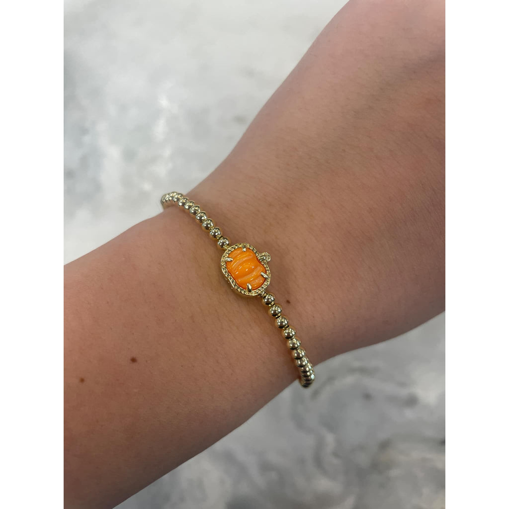 KENDRA SCOTT PUMPKIN STRETCH BRACELET GOLD ORANGE MOTHER OF PEARL