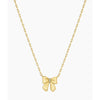 Gold bow-shaped pendant on a chain against a white background