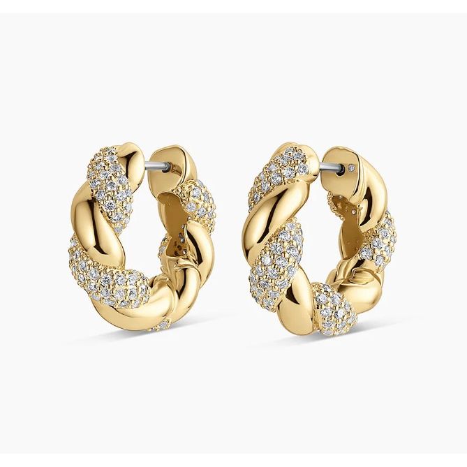 Gold hoop earrings with diamond accents on a white background