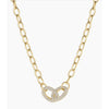 Gold chain necklace with a heart-shaped clasp on a white background