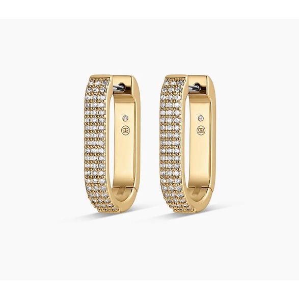 Gold huggie earrings with diamond accents on front.