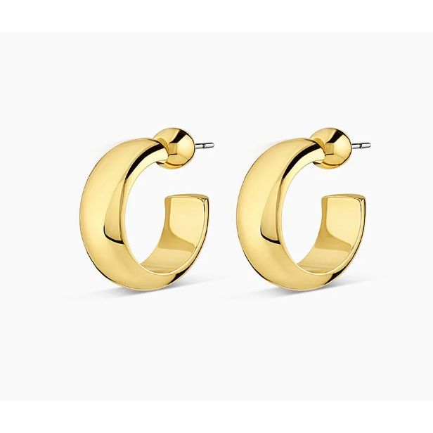 Gold hoop earrings on a white background