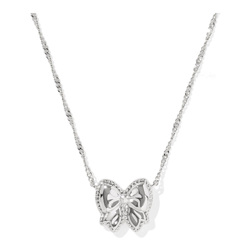 Silver bow necklace on a white background