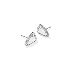Pair of silver earrings with clear gemstones on a white background