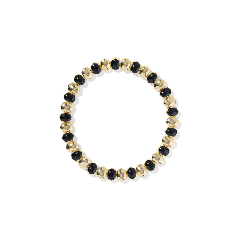 Gold and black beaded bracelet on a white background