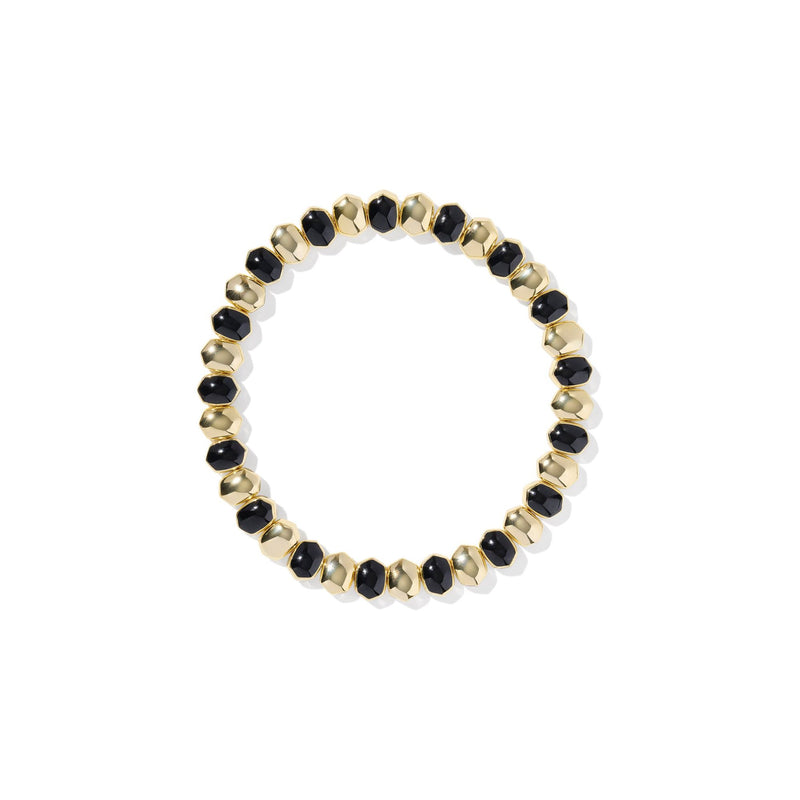 Gold and black beaded bracelet on a white background