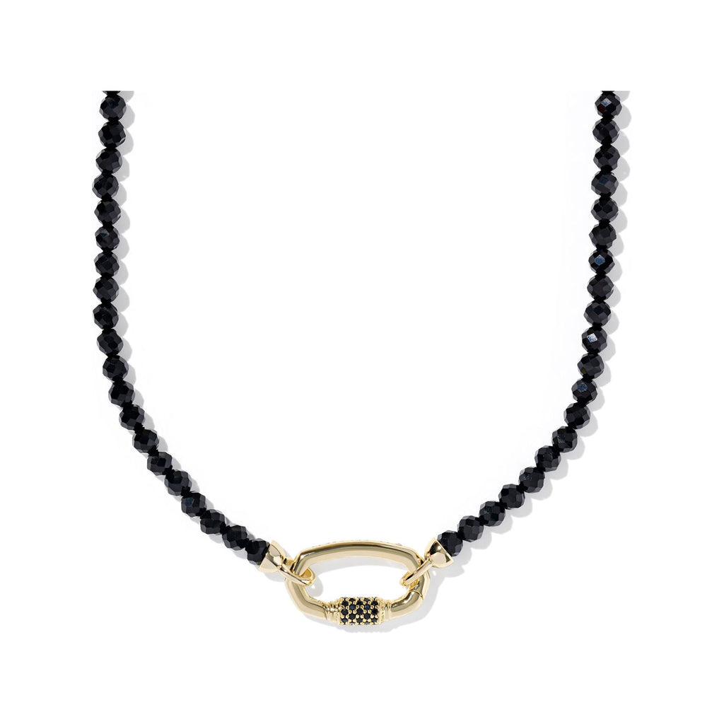 Black beaded necklace with a gold clasp on a white background
