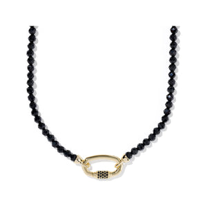 Black beaded necklace with a gold clasp on a white background