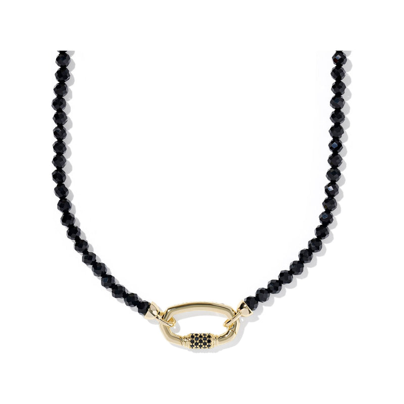 Black beaded necklace with a gold clasp on a white background