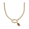 Gold necklace with a pendant on a white background