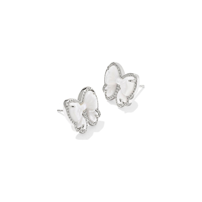 Bow-shaped earrings on a white background