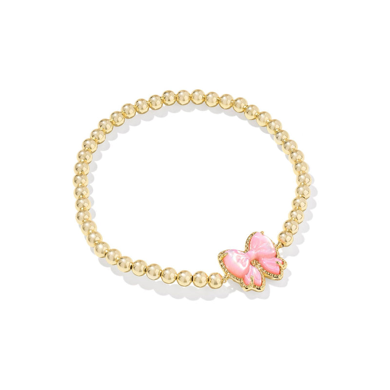 Bracelet with pink bow charm on a white background