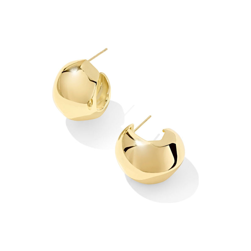 Gold hoop earrings on a white background