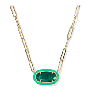 Gold chain necklace with a green pendant on a white background